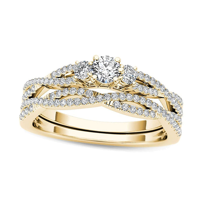 0.5 CT. TW Diamond Three Stone Twist Bridal Set in 14K Gold