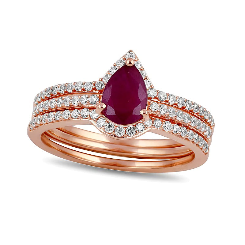 Pear-Shaped Ruby and 0.33 CT. TW Diamond Three-Piece Wedding Ring Set in 10K Rose Gold