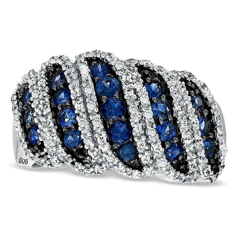 Blue Sapphire and 0.33 CT. TW Diamond Band in Sterling Silver