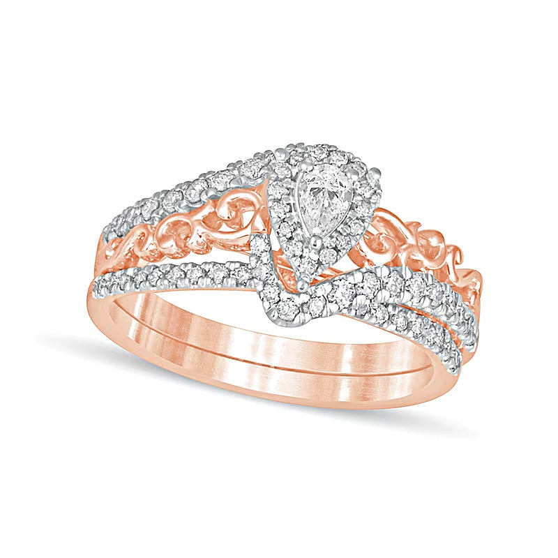 0.63 CT. TW Pear-Shaped Diamond Double Frame Filigree Bypass Bridal Set in 10K Rose Gold