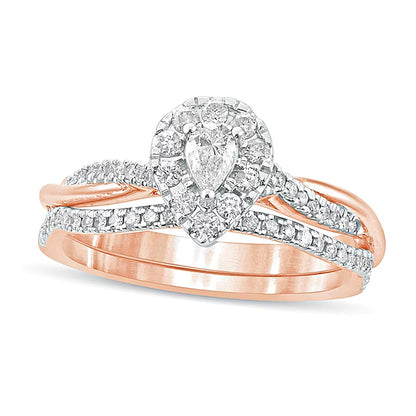 0.5 CT. TW Pear-Shaped Diamond Frame Twist Shank Bridal Set in 10K Rose Gold