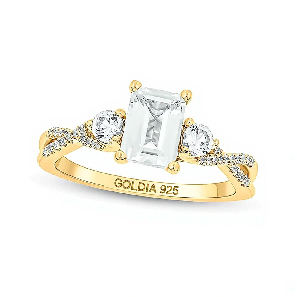 Emerald-Cut White lab-Created Sapphire and 0.1 CT. TW Diamond Three Stone Ring in Sterling Silver and 14K Gold Plate
