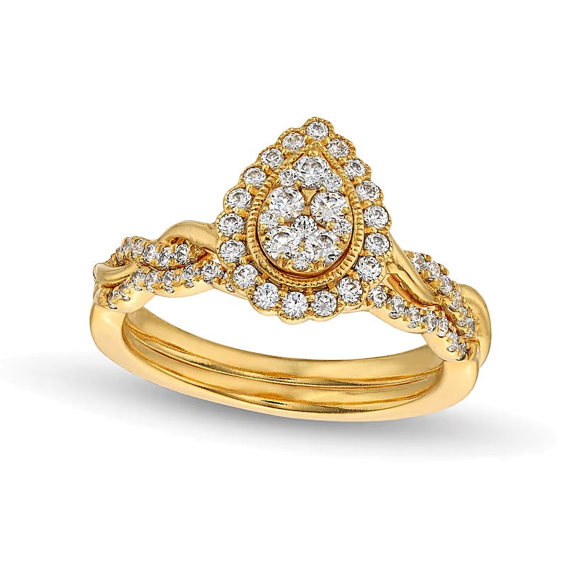 0.5 CT. TW Diamond Pear Frame Twist Shank Bridal Set Ring in 10K Gold