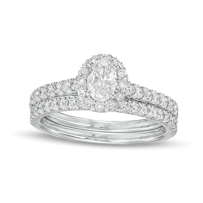 1.0 CT. TW Oval Diamond Frame Bridal Set in 10K White Gold