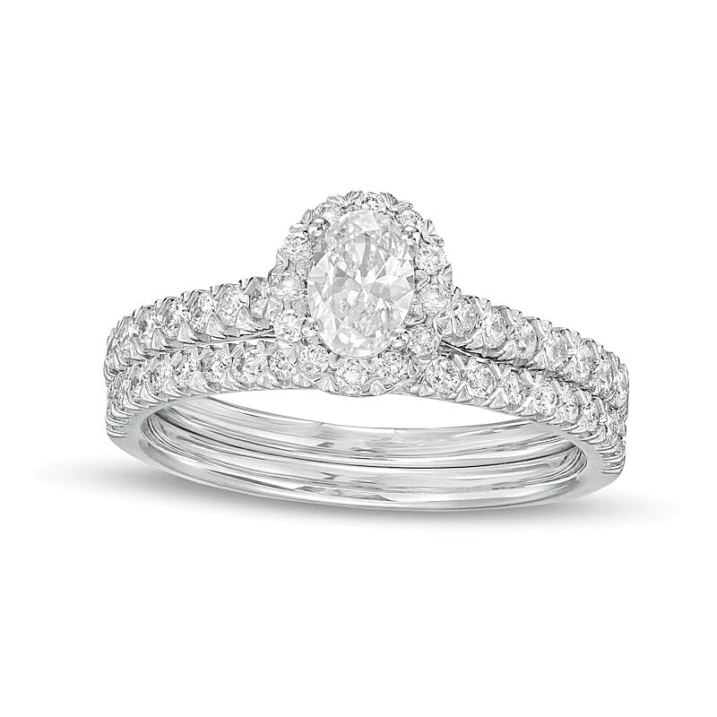 1.0 CT. TW Oval Diamond Frame Bridal Set in 10K White Gold
