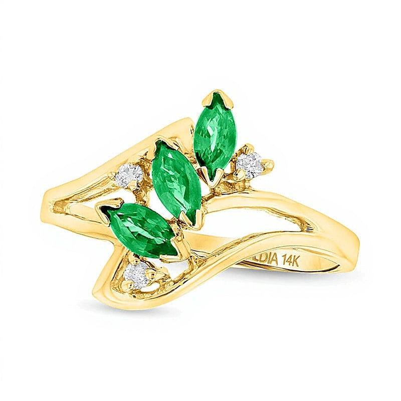 Marquise Emerald and Diamond Accent Three Stone Bypass Ring in 14K Gold