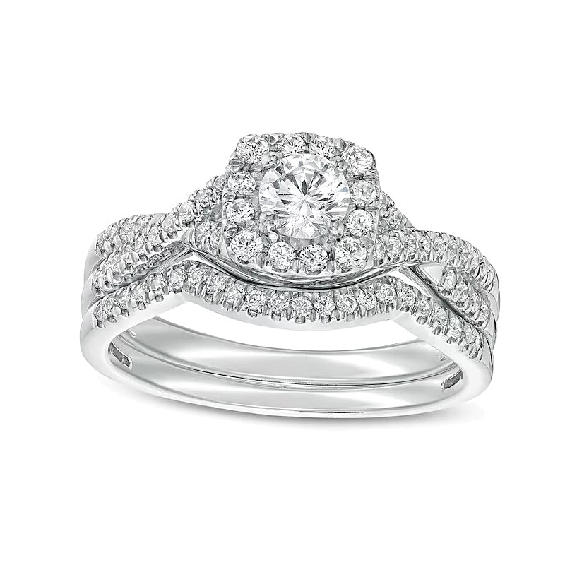 0.75 CT. TW Diamond Cushion-Shaped Frame Twist Shank Bridal Set in 14K White Gold (I/I2)