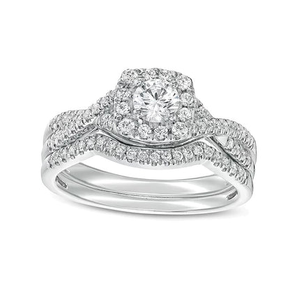 0.75 CT. TW Diamond Cushion-Shaped Frame Twist Shank Bridal Set in 14K White Gold (I/I2)