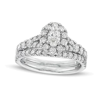 1.5 CT. TW Oval Diamond Frame Split Shank Bridal Set in 10K White Gold