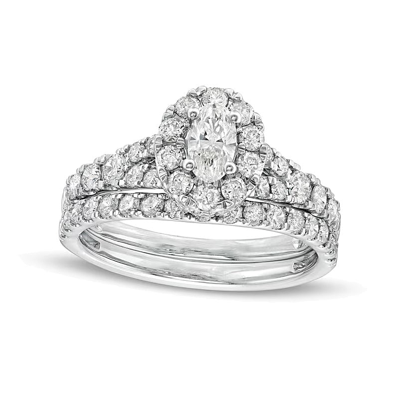 1.5 CT. TW Oval Diamond Frame Split Shank Bridal Set in 10K White Gold