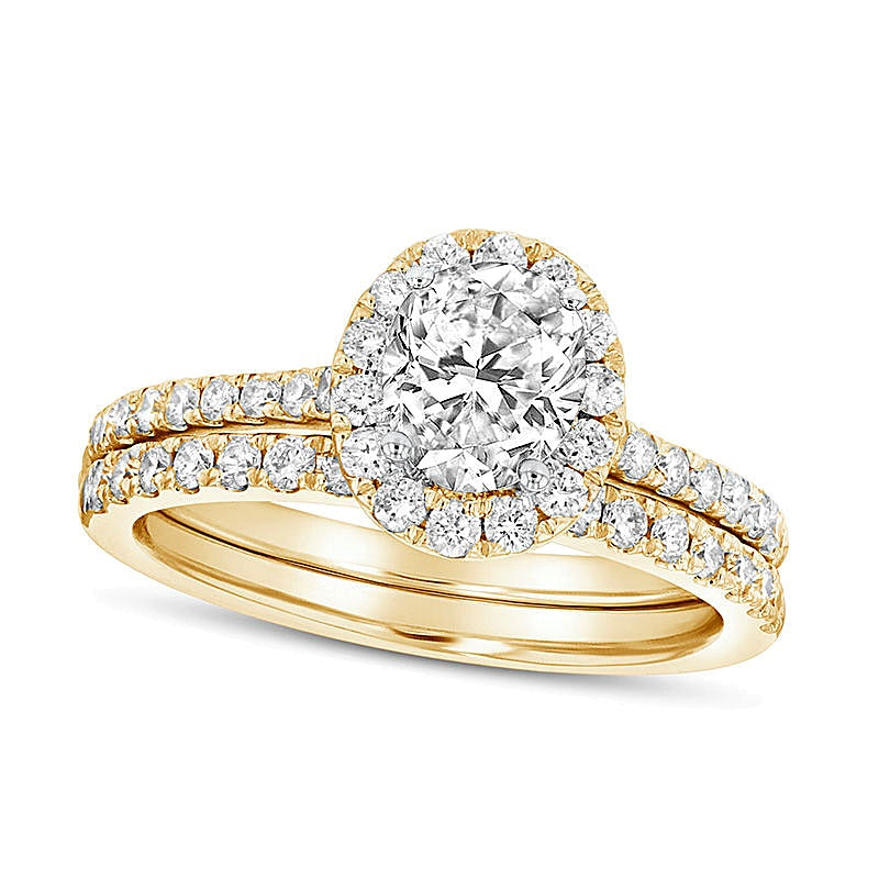 1.33 CT. TW Oval Diamond Frame Bridal Set in 14K Gold (J/SI2)
