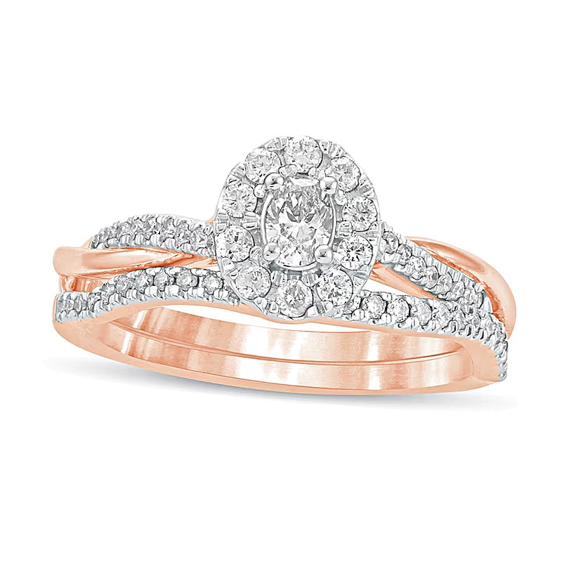 0.5 CT. TW Oval Diamond Frame Twist Shank Bridal Set in 10K Rose Gold