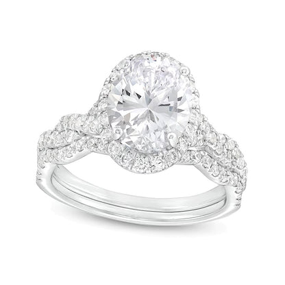 2.63 CT. TW Oval Lab-Grown Diamond Frame Twist Shank Bridal Set in 14K White Gold (I/SI2)