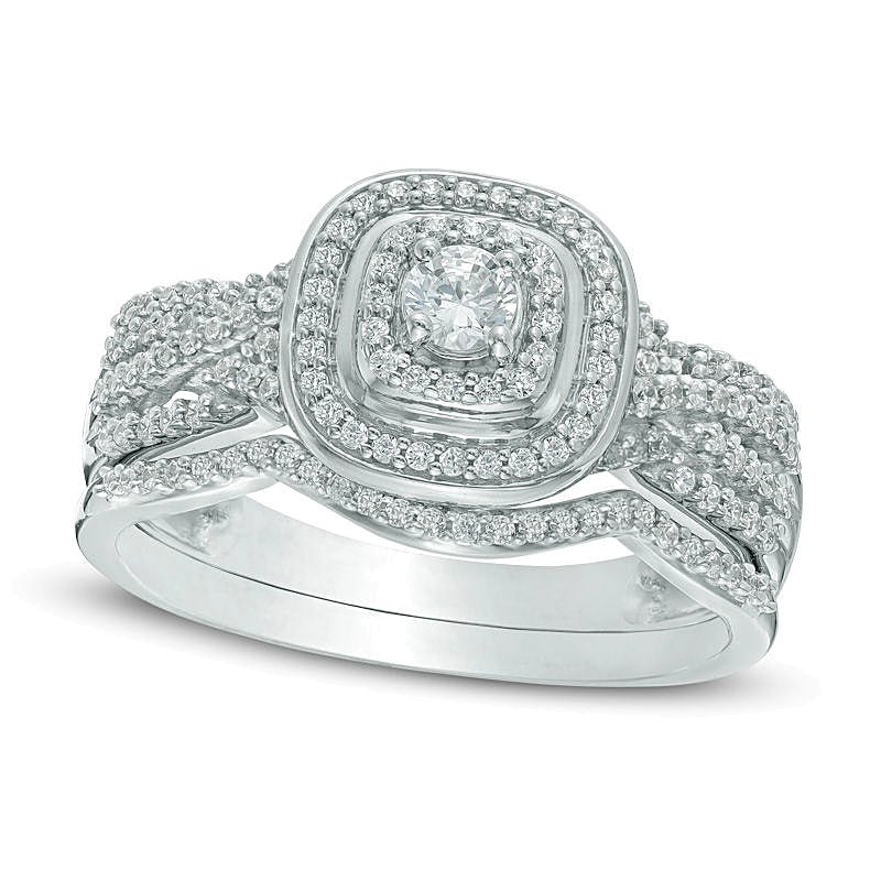 0.5 CT. TW Diamond Cushion Frame Twist Shank Bridal Set in 10K White Gold