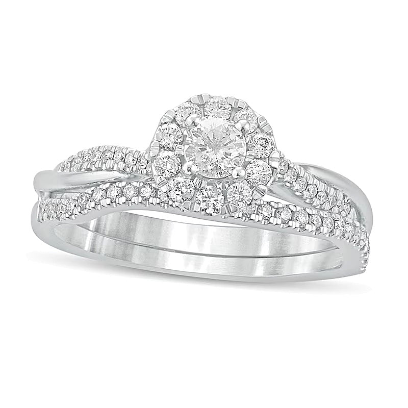 0.5 CT. TW Diamond Frame Twist Shank Bridal Set in 10K White Gold