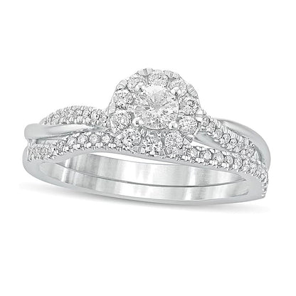 0.5 CT. TW Diamond Frame Twist Shank Bridal Set in 10K White Gold