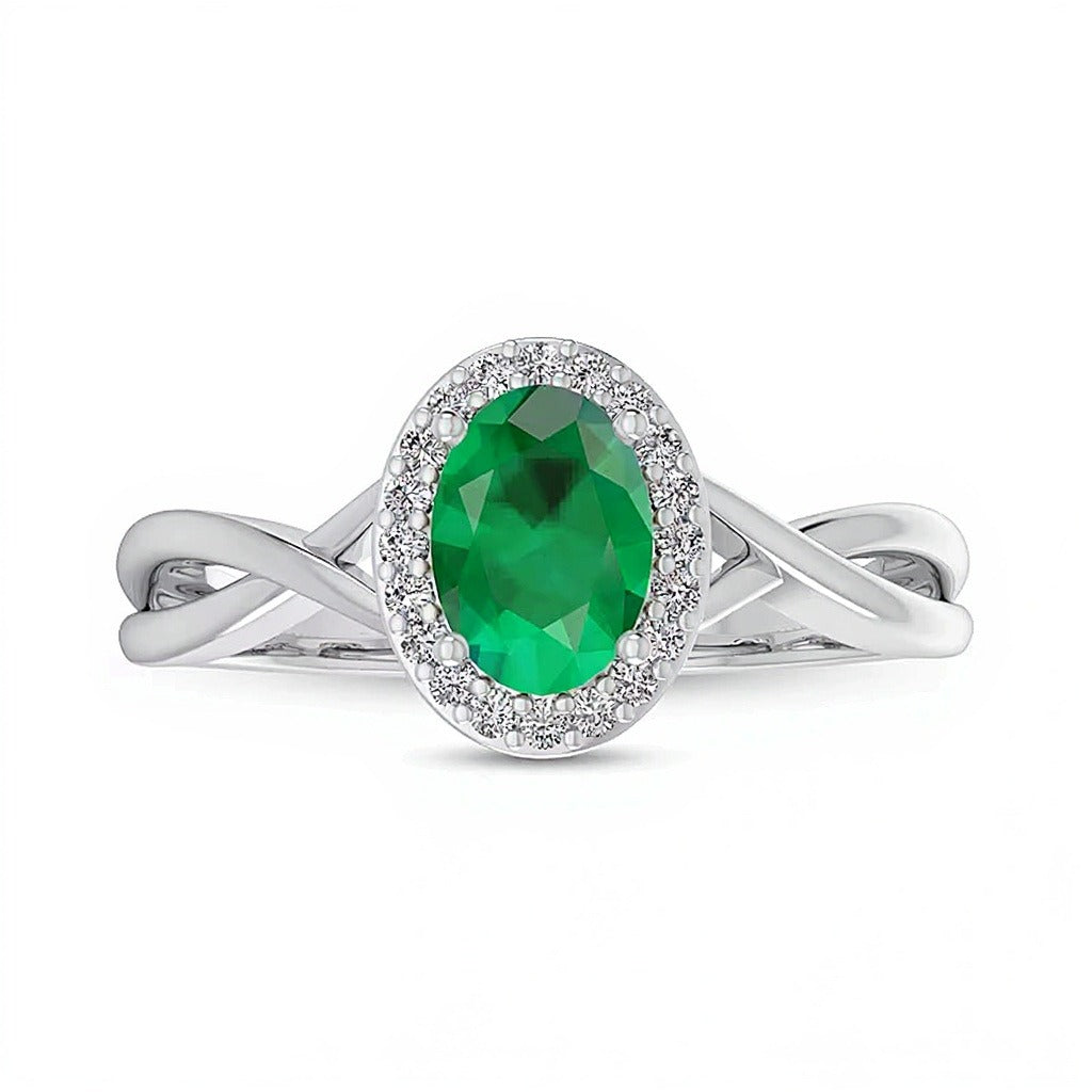 Oval Emerald and 0.07 CT. TW Diamond Frame Crossover Shank Ring in 10K White Gold