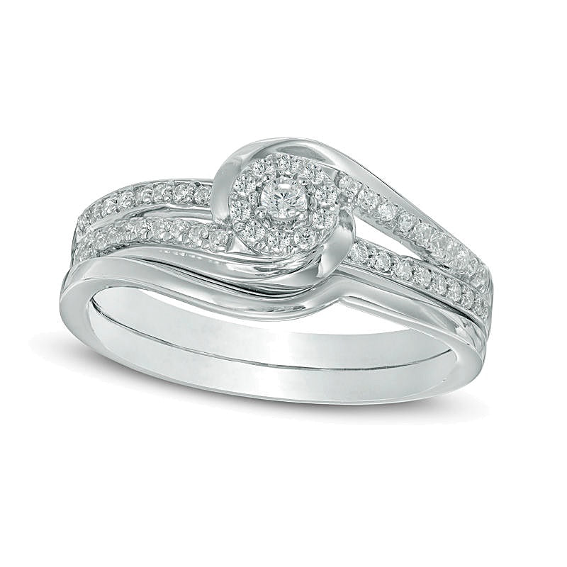 0.25 CT. TW Diamond Swirl Frame Bridal Set in 10K White Gold