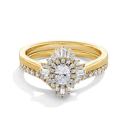 0.75 CT. TW Oval Diamond Double Sunburst Frame Bridal Set in 14K Gold