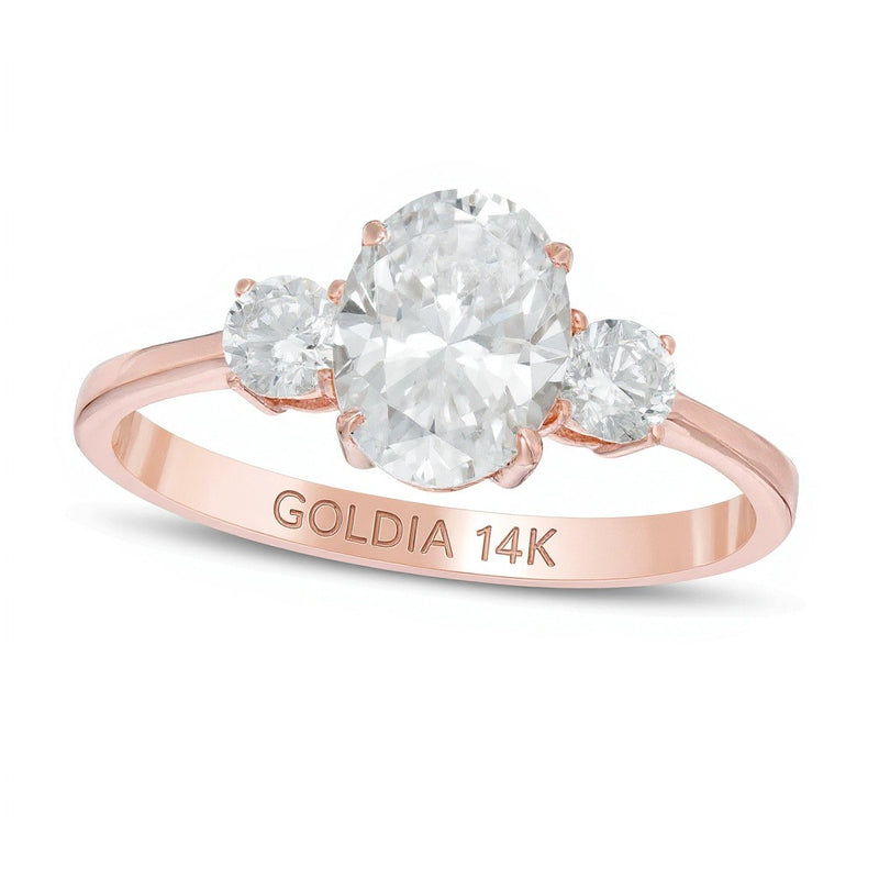 1.25 CT. TW Oval and Round Diamond Three Stone Engagement Ring in 14K Rose Gold
