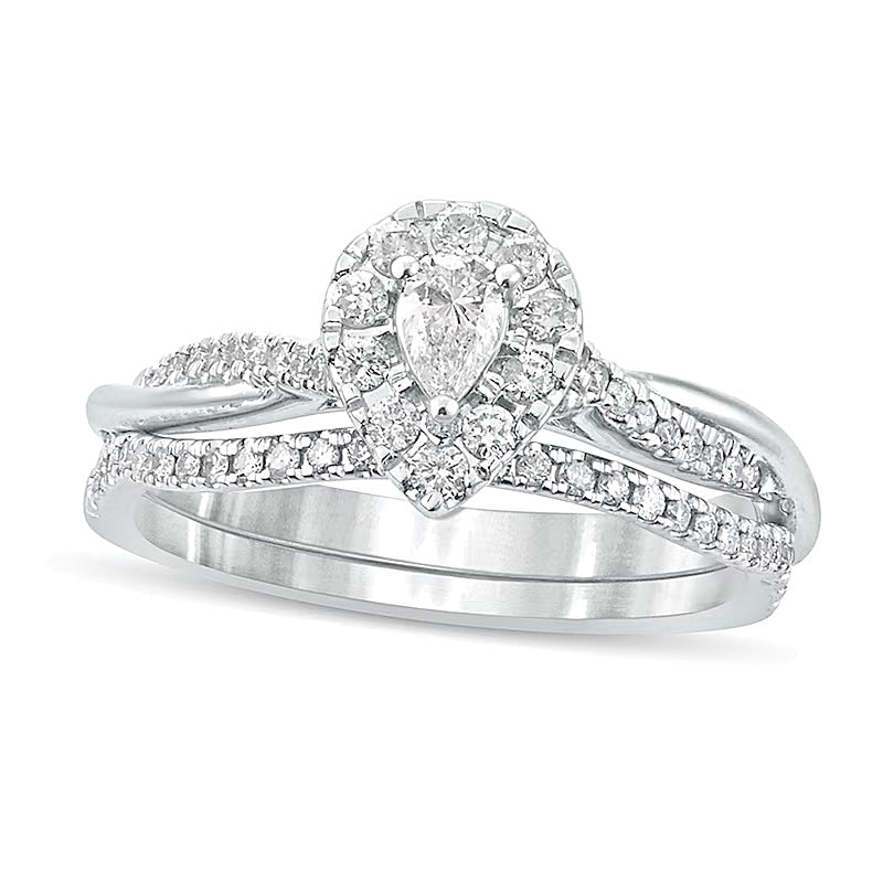 0.5 CT. TW Pear-Shaped Diamond Frame Twist Shank Bridal Set in 10K White Gold