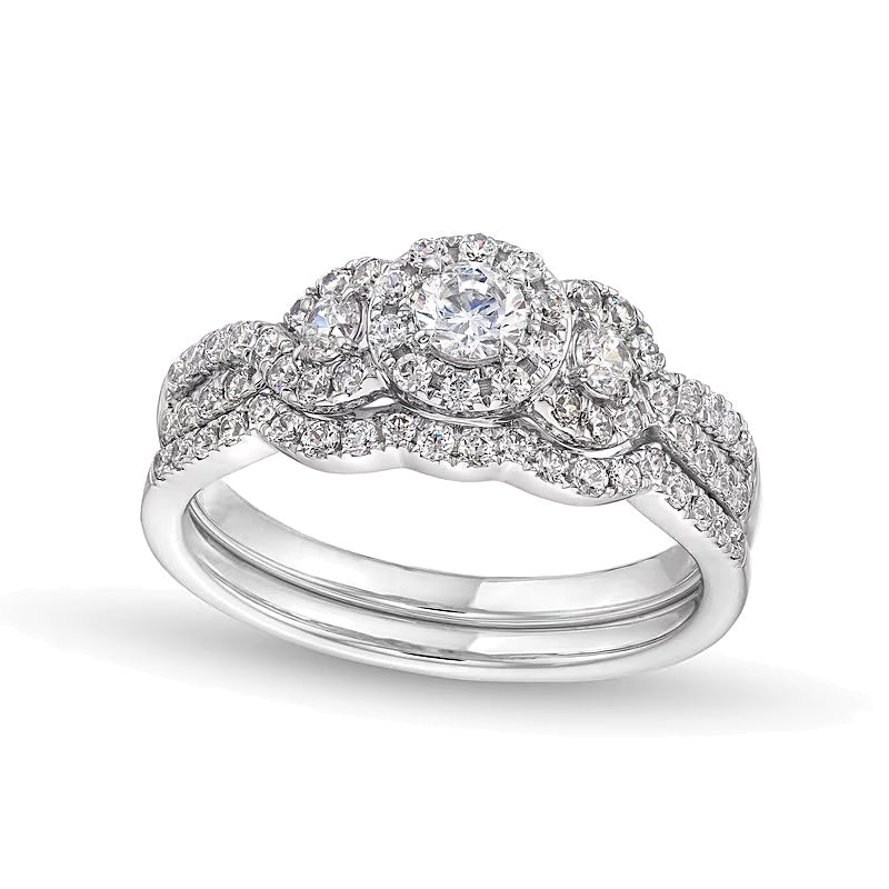 0.88 CT. TW Diamond Three Stone Framed Bridal Set in 10K White Gold