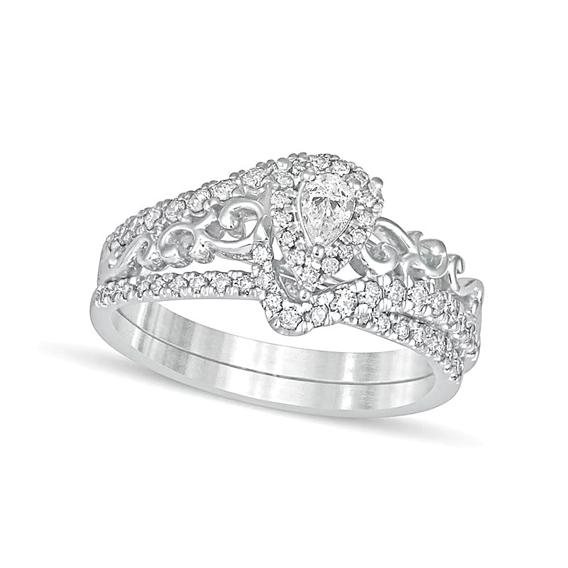 0.63 CT. TW Pear-Shaped Diamond Frame Filigree Bypass Bridal Set in 10K White Gold