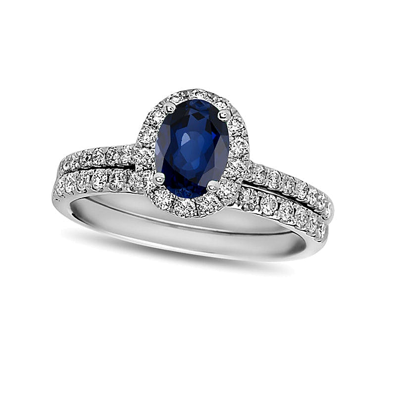 Oval Blue Sapphire and 0.63 CT. TW Diamond Frame Bridal Set in 14K White Gold