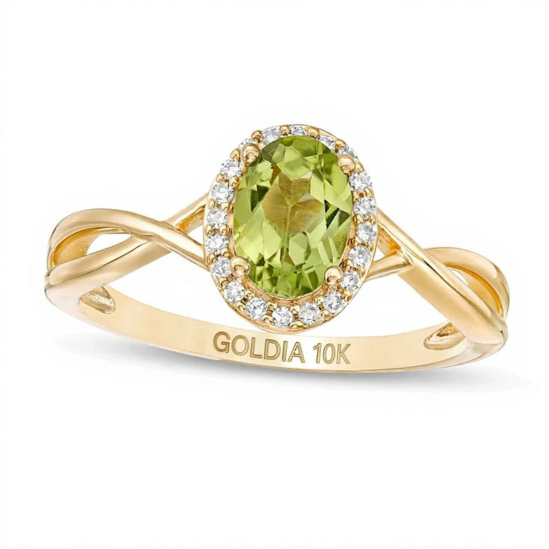 Oval Peridot and 0.07 CT. TW Diamond Frame Twist Shank Ring in 10K Gold