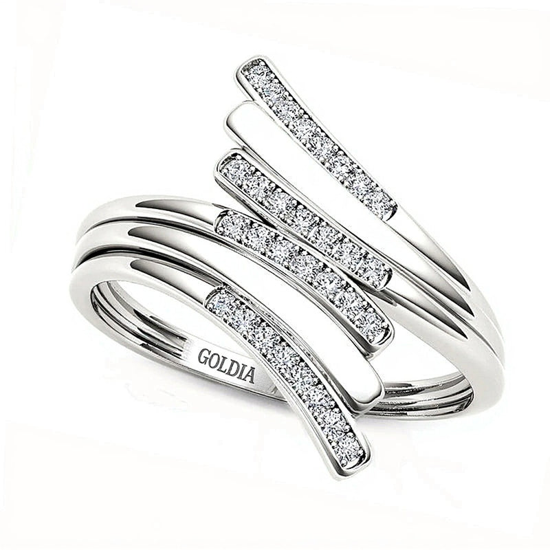 0.1 CT. TW Diamond Bypass Ring in 10K White Gold