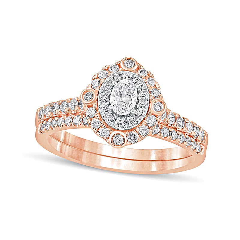 0.63 CT. TW Oval Diamond Double Frame Bridal Set in 10K Rose Gold