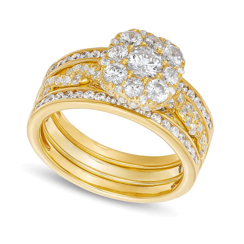 1.5 CT. TW Cushion Multi-Diamond Twist Shank Three Piece Bridal Set in 10K Gold
