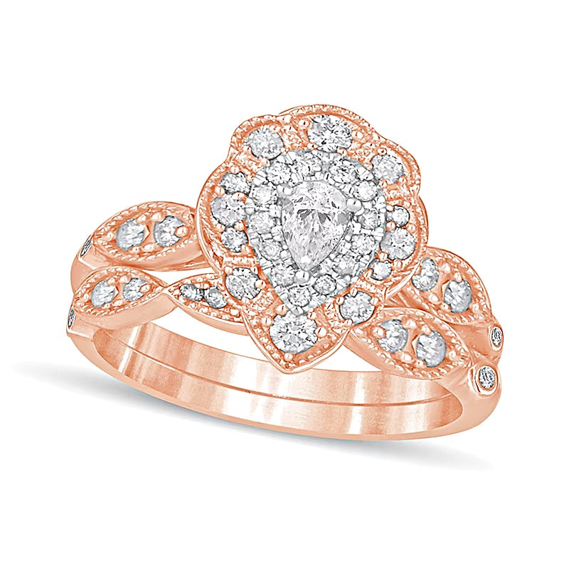 0.63 CT. TW Pear-Shaped Diamond Double Petal Frame Vintage-Style Bridal Set in 10K Rose Gold