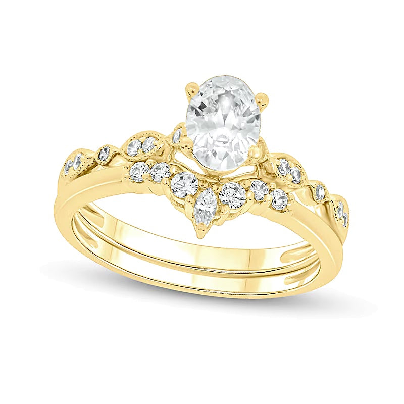 0.75 CT. TW Oval Diamond Contour Vintage-Style Bridal Set in 14K Gold (I/I2)