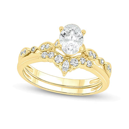 0.75 CT. TW Oval Diamond Contour Vintage-Style Bridal Set in 14K Gold (I/I2)