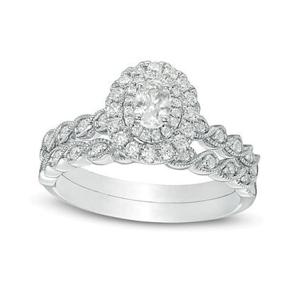 0.75 CT. TW Oval Diamond Double Frame Twist Vintage-Style Bridal Set in 14K White Gold