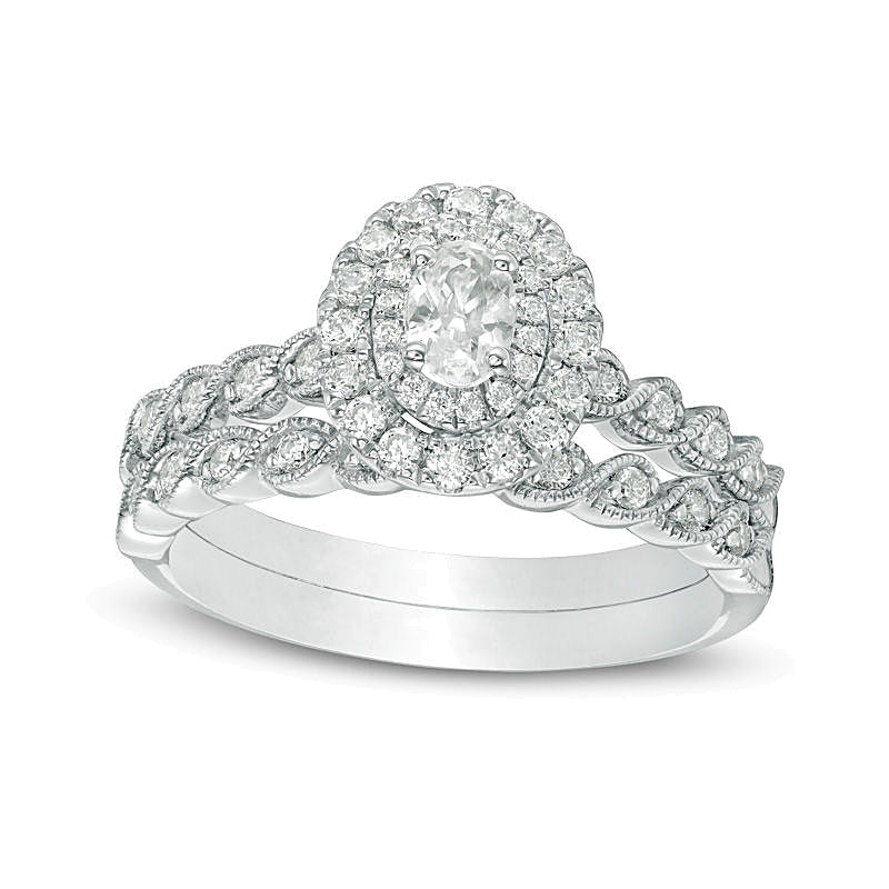 0.75 CT. TW Oval Diamond Double Frame Twist Vintage-Style Bridal Set in 14K White Gold