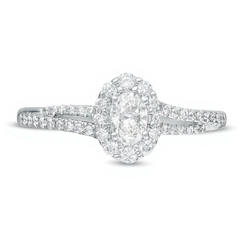 0.5 CT. TW Oval Diamond Frame Split Shank Engagement Ring in 10K White Gold