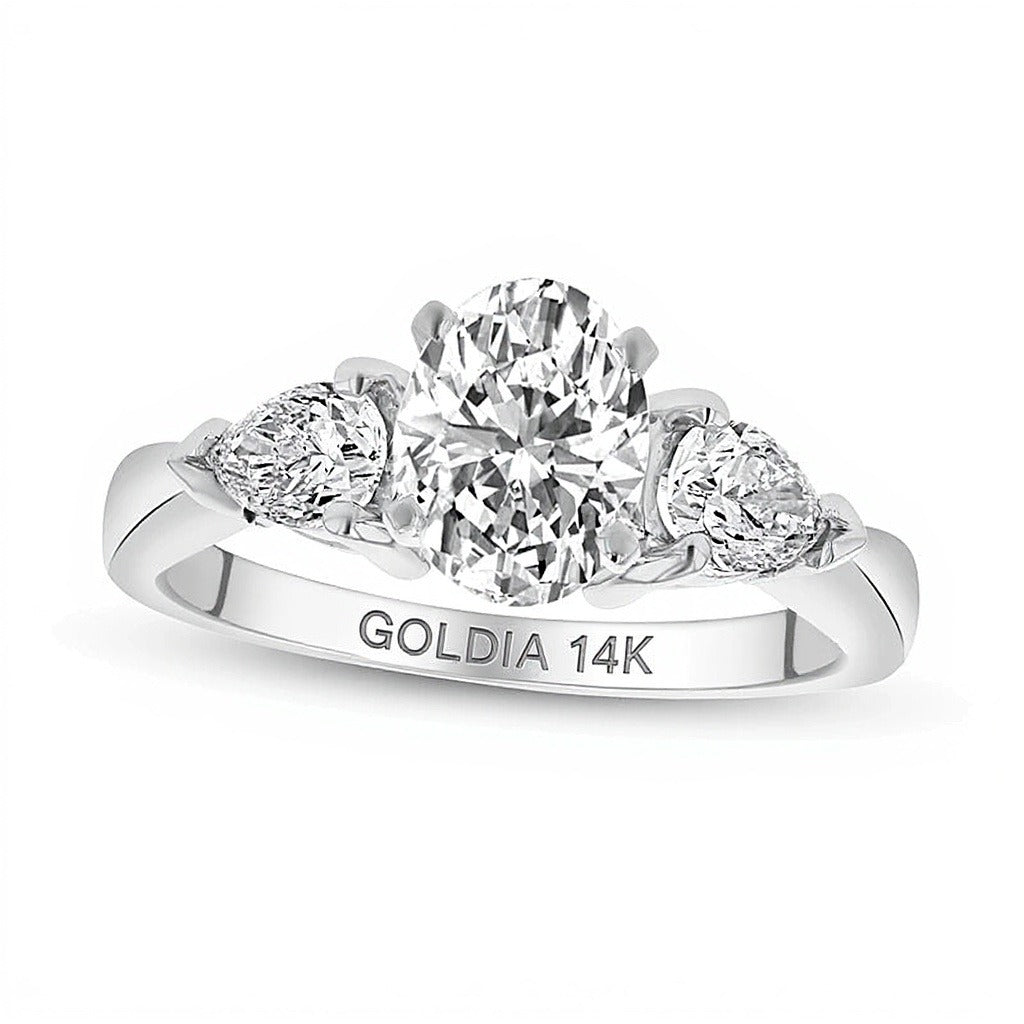 1.63 CT. TW Oval and Pear-Shaped Diamond Three Stone Tapered Shank Engagement Ring in 14K White Gold (I/SI2)