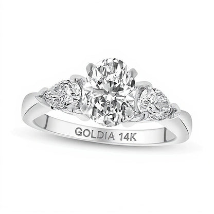 1.63 CT. TW Oval and Pear-Shaped Diamond Three Stone Tapered Shank Engagement Ring in 14K White Gold (I/SI2)