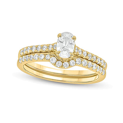 1.0 CT. TW Oval Diamond Bridal Set in 14K Gold (I/I2)