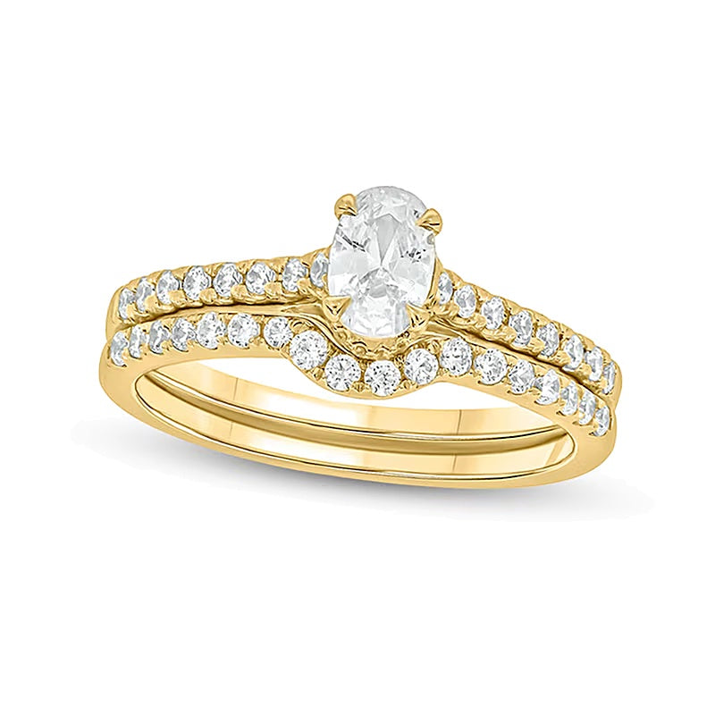 1.0 CT. TW Oval Diamond Bridal Set in 14K Gold (I/I2)