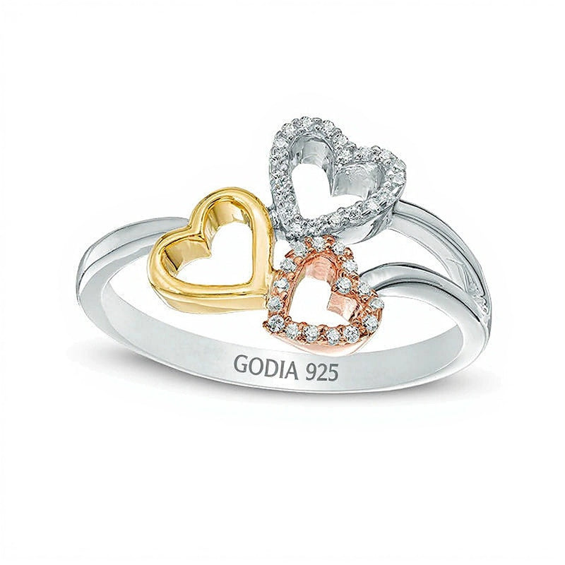 0.1 CT. TW Diamond Triple Heart Ring in Sterling Silver and 10K Two-Tone Gold