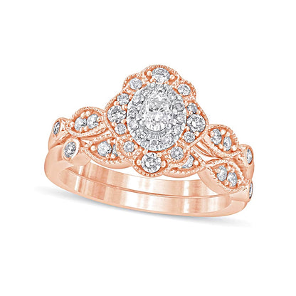 0.63 CT. TW Oval Diamond Double Petal Frame Vintage-Style Bridal Set in 10K Rose Gold