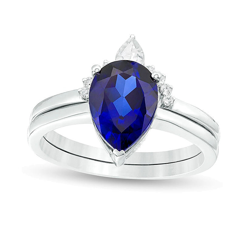 Pear-Shaped Lab-Created Blue Sapphire, White Topaz and 0.05 CT. TW Diamond Crown Bridal Set in 10K White Gold