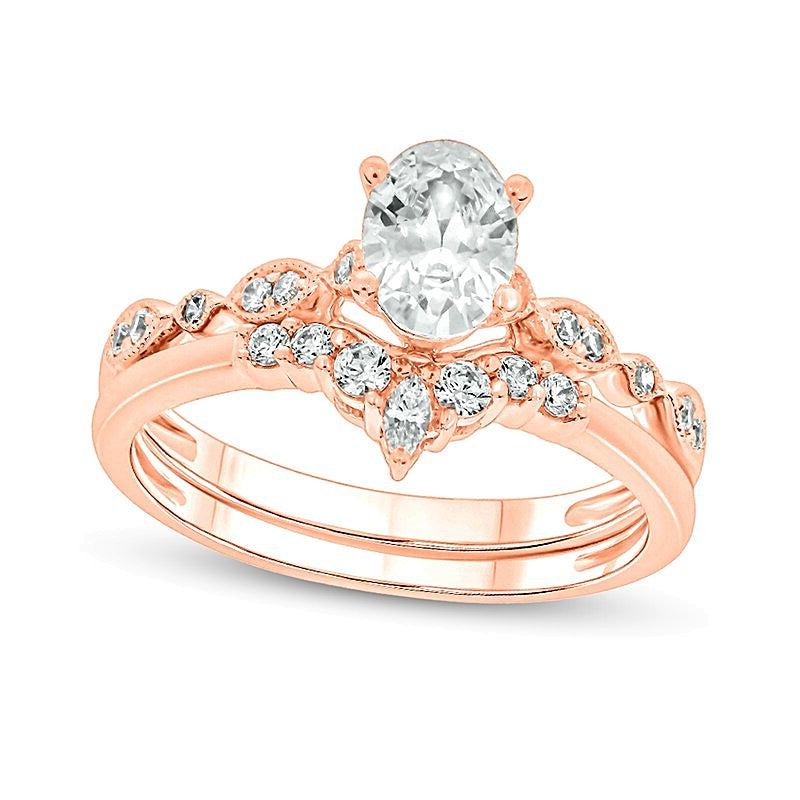 0.75 CT. TW Oval Diamond Contour Vintage-Style Bridal Set in 14K Rose Gold (I/I2)