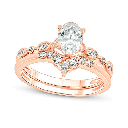 0.75 CT. TW Oval Diamond Contour Vintage-Style Bridal Set in 14K Rose Gold (I/I2)