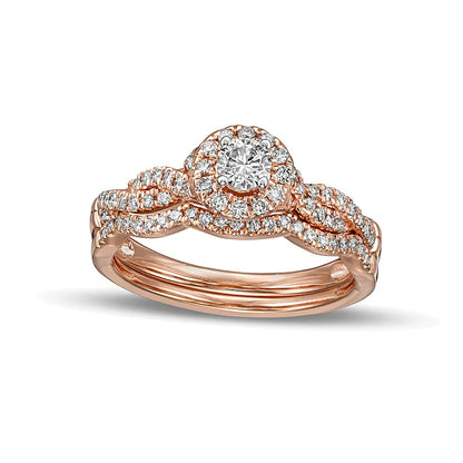 0.5 CT. TW Diamond Frame Twist Shank Bridal Set in 10K Rose Gold (I/I2)