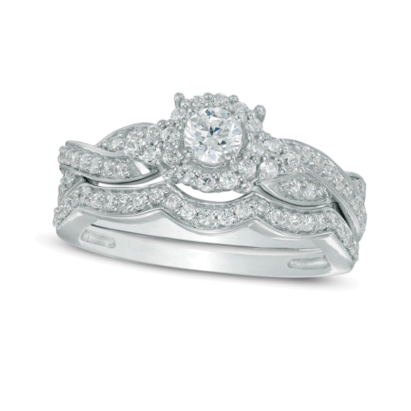 0.63 CT. TW Diamond Frame Twist Bridal Set in 10K White Gold