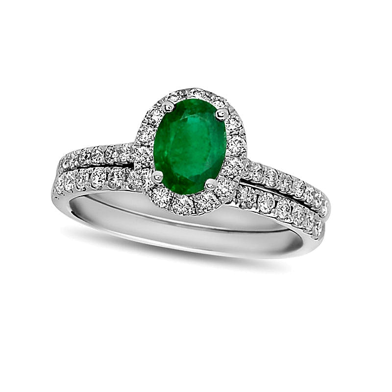Oval Emerald and 0.63 CT. TW Diamond Frame Bridal Set in 14K White Gold